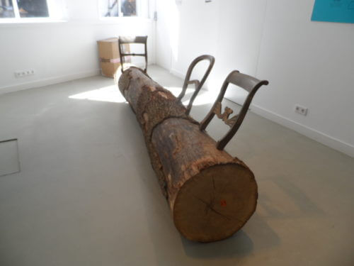 A famous Droog Design product of a tree trunk made into a bench