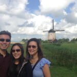 Family in front of windmill on a Private Amsterdam Windmill Tour