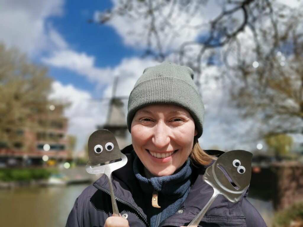 Lee with our cheese slicer with googly eyes mascots