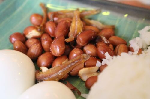 A close up of peanutrs and little fishes, a Malaysian dish