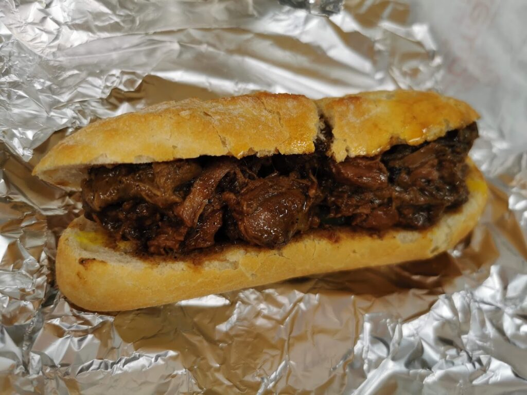 A bread roll from Tokoman with Surinamese style slow cooked beef filling