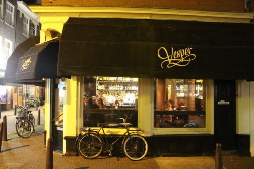 A small cocktail bar on a street corner